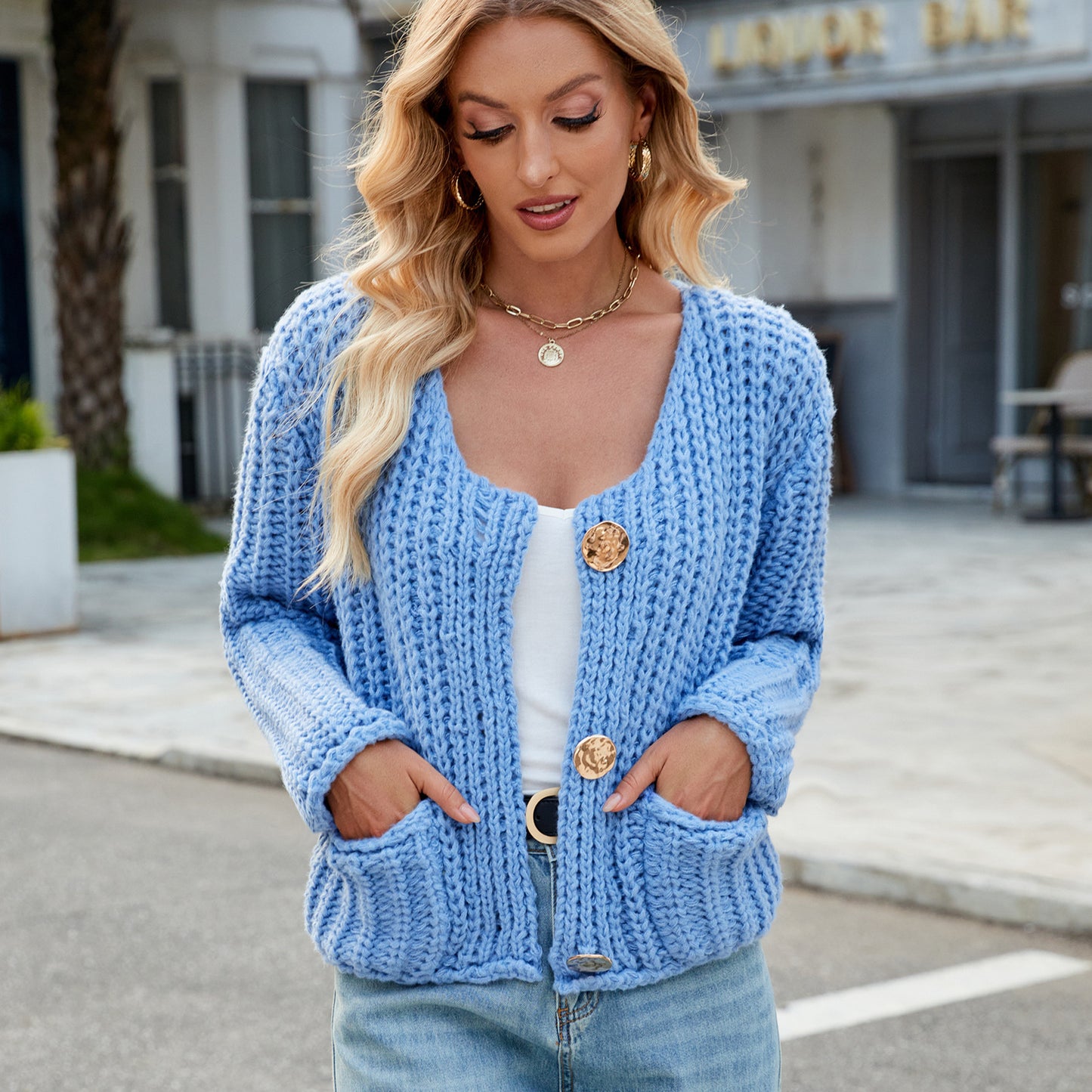 A Women's V-neck Three-button Sleeveless Cardigan free delivery