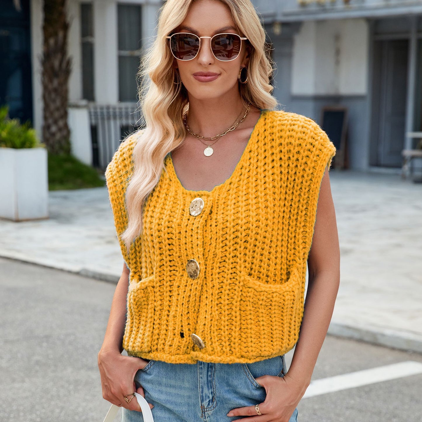 A Women's V-neck Three-button Sleeveless Cardigan free delivery