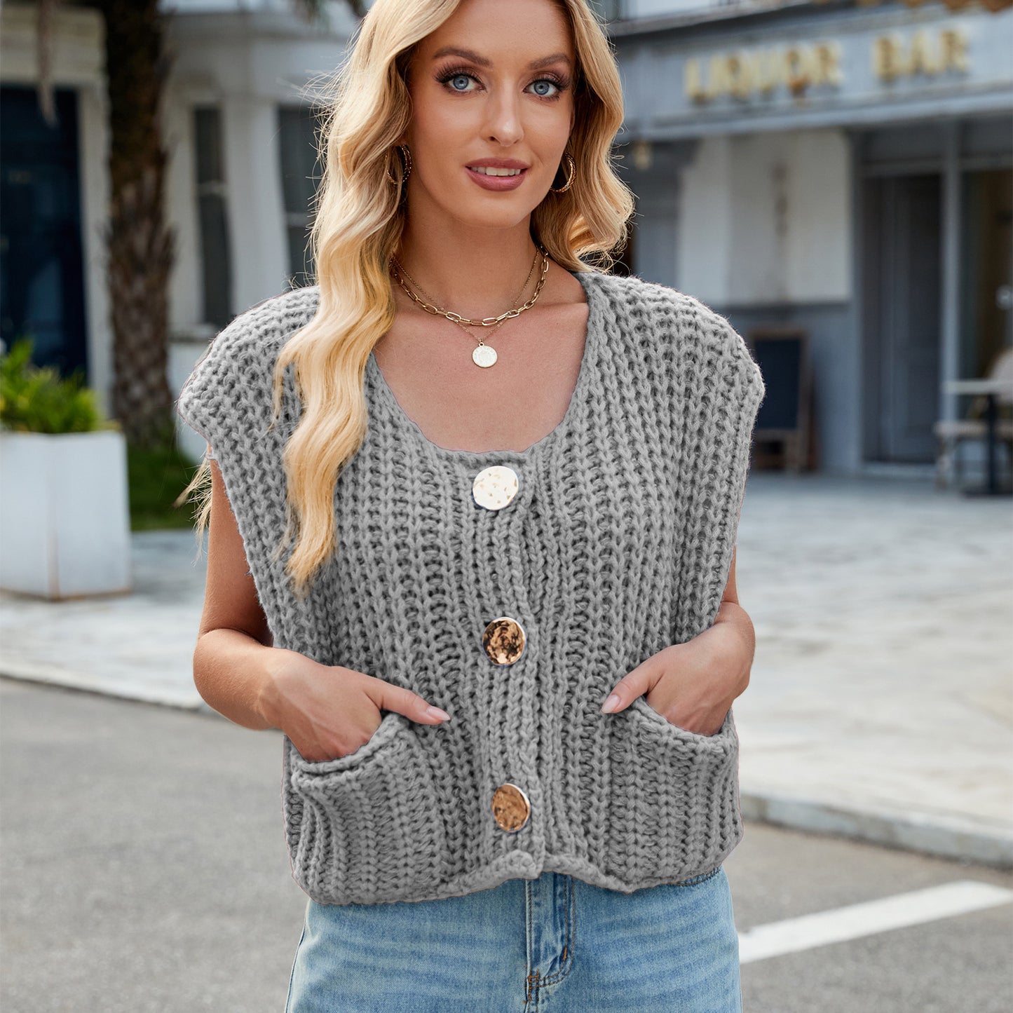 A Women's V-neck Three-button Sleeveless Cardigan free delivery