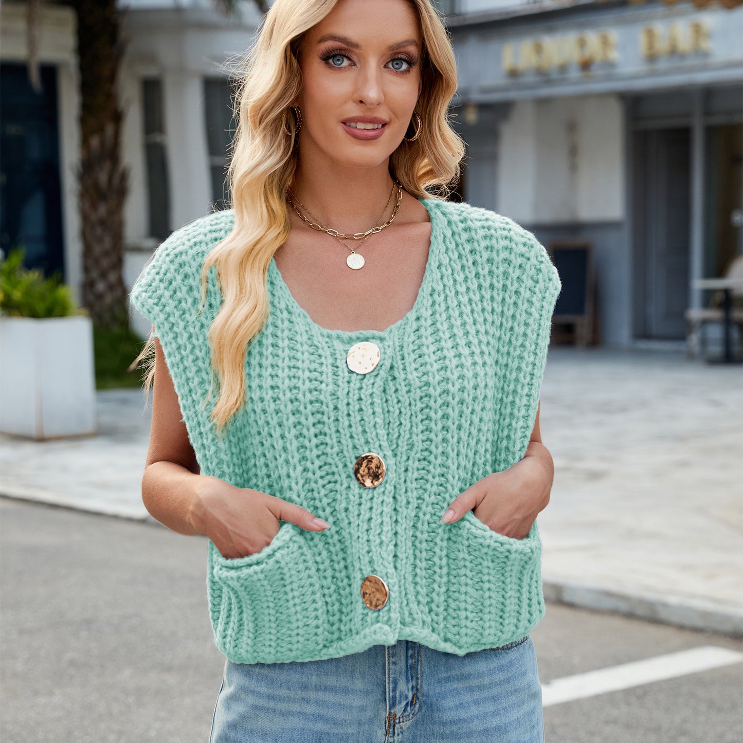 A Women's V-neck Three-button Sleeveless Cardigan free delivery