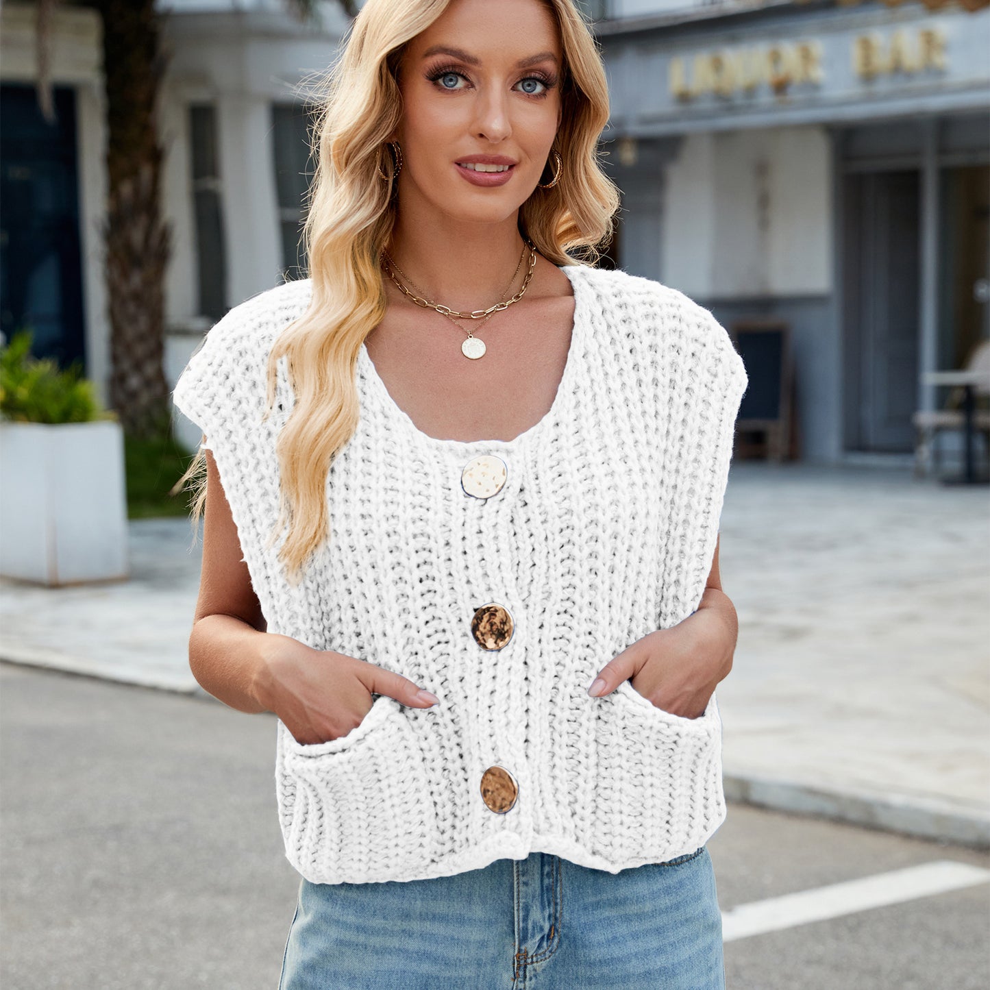 A Women's V-neck Three-button Sleeveless Cardigan free delivery