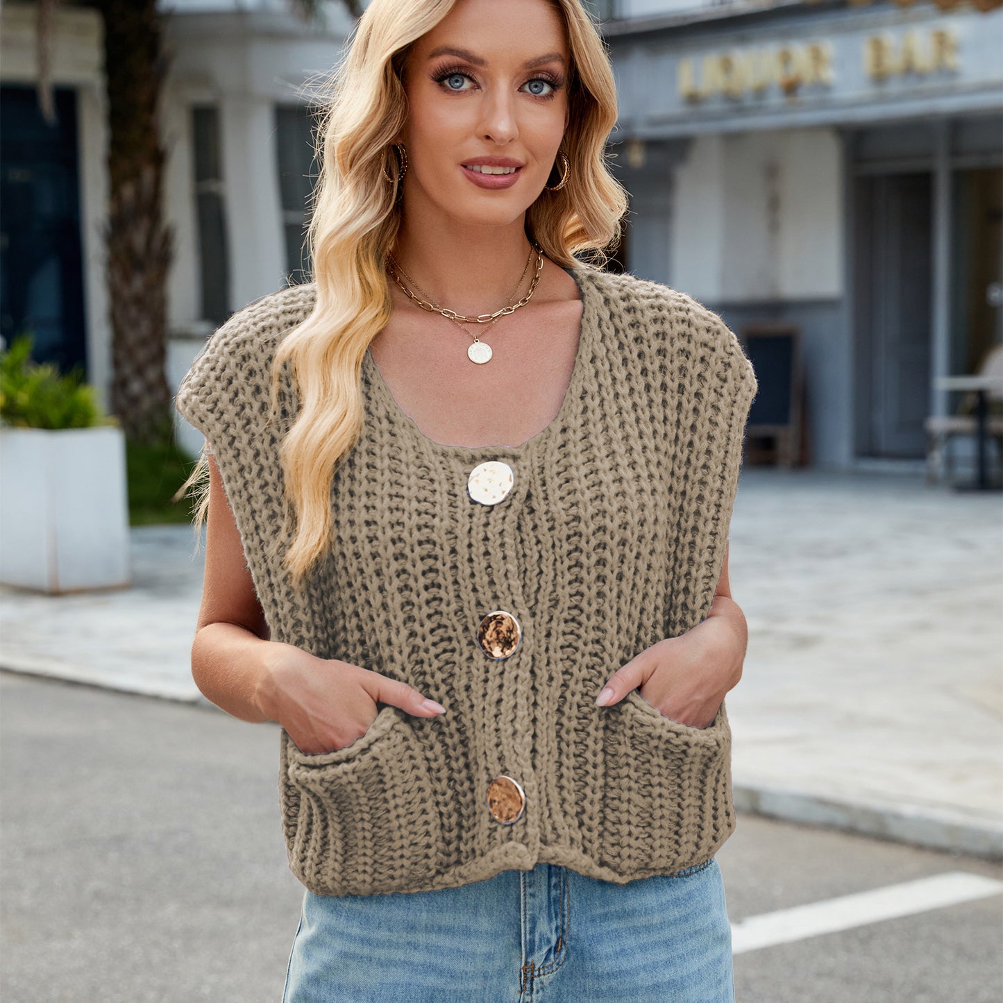 A Women's V-neck Three-button Sleeveless Cardigan free delivery