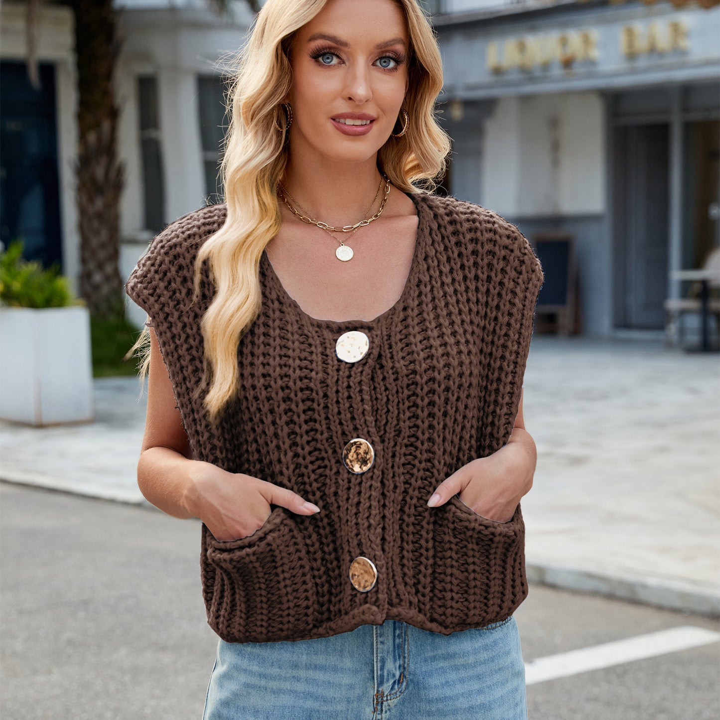 A Women's V-neck Three-button Sleeveless Cardigan free delivery