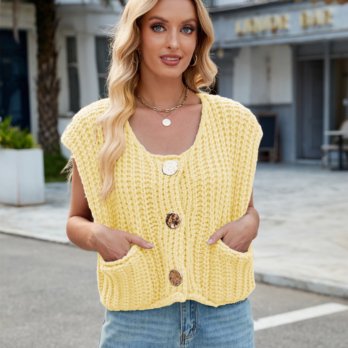 A Women's V-neck Three-button Sleeveless Cardigan free delivery