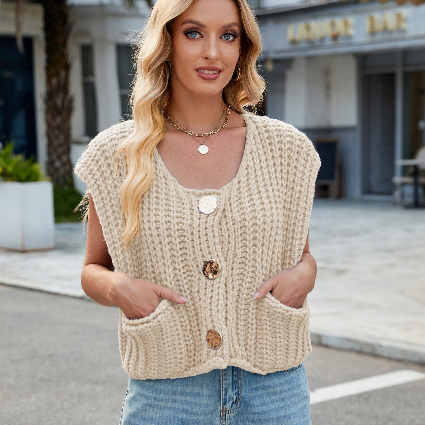 A Women's V-neck Three-button Sleeveless Cardigan free delivery