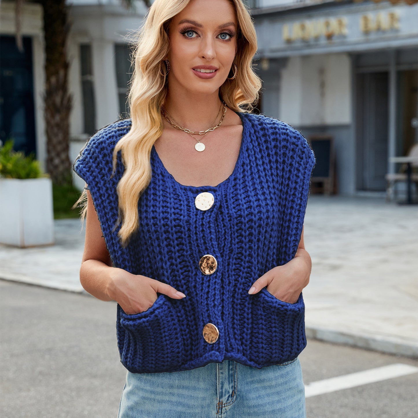 A Women's V-neck Three-button Sleeveless Cardigan free delivery