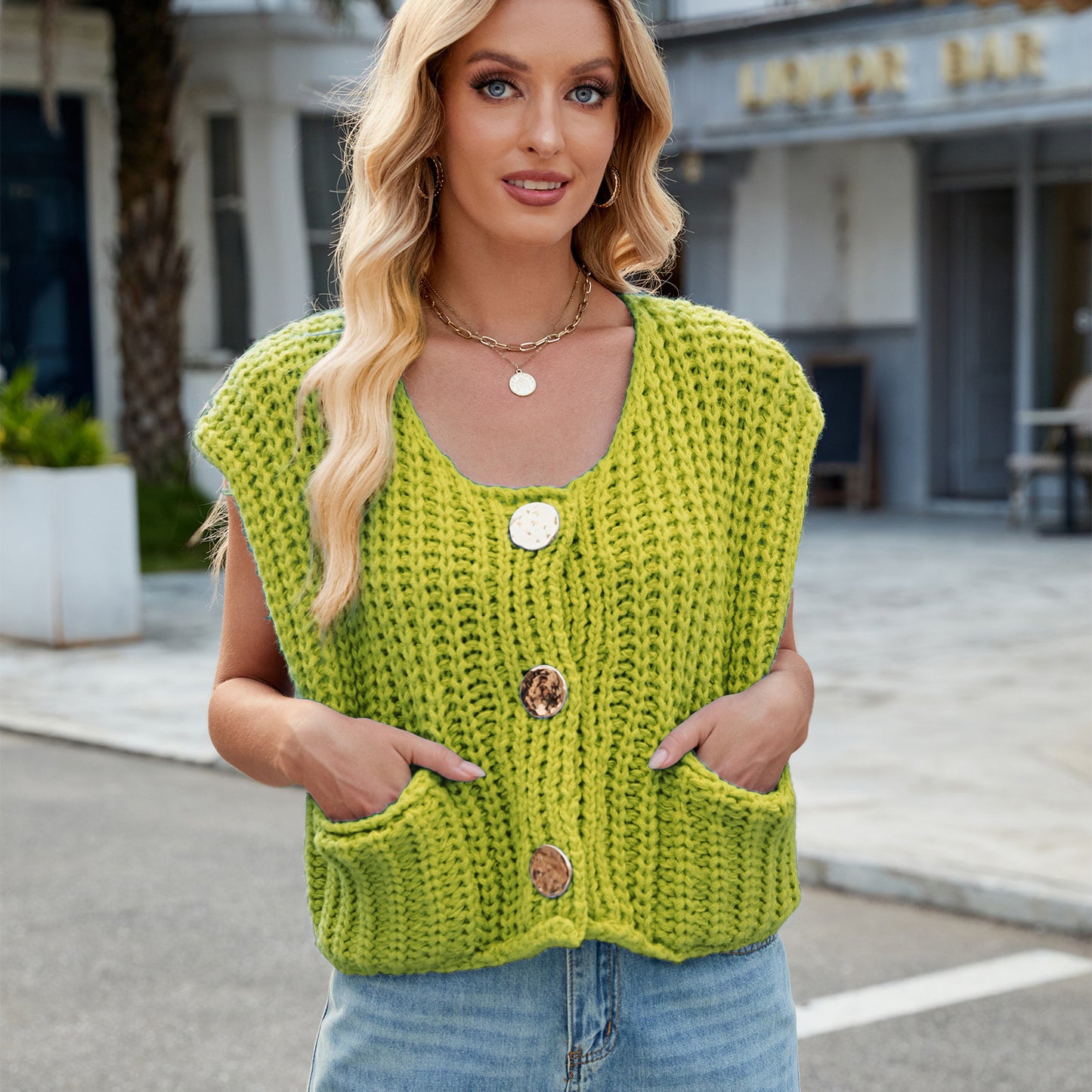 A Women's V-neck Three-button Sleeveless Cardigan free delivery