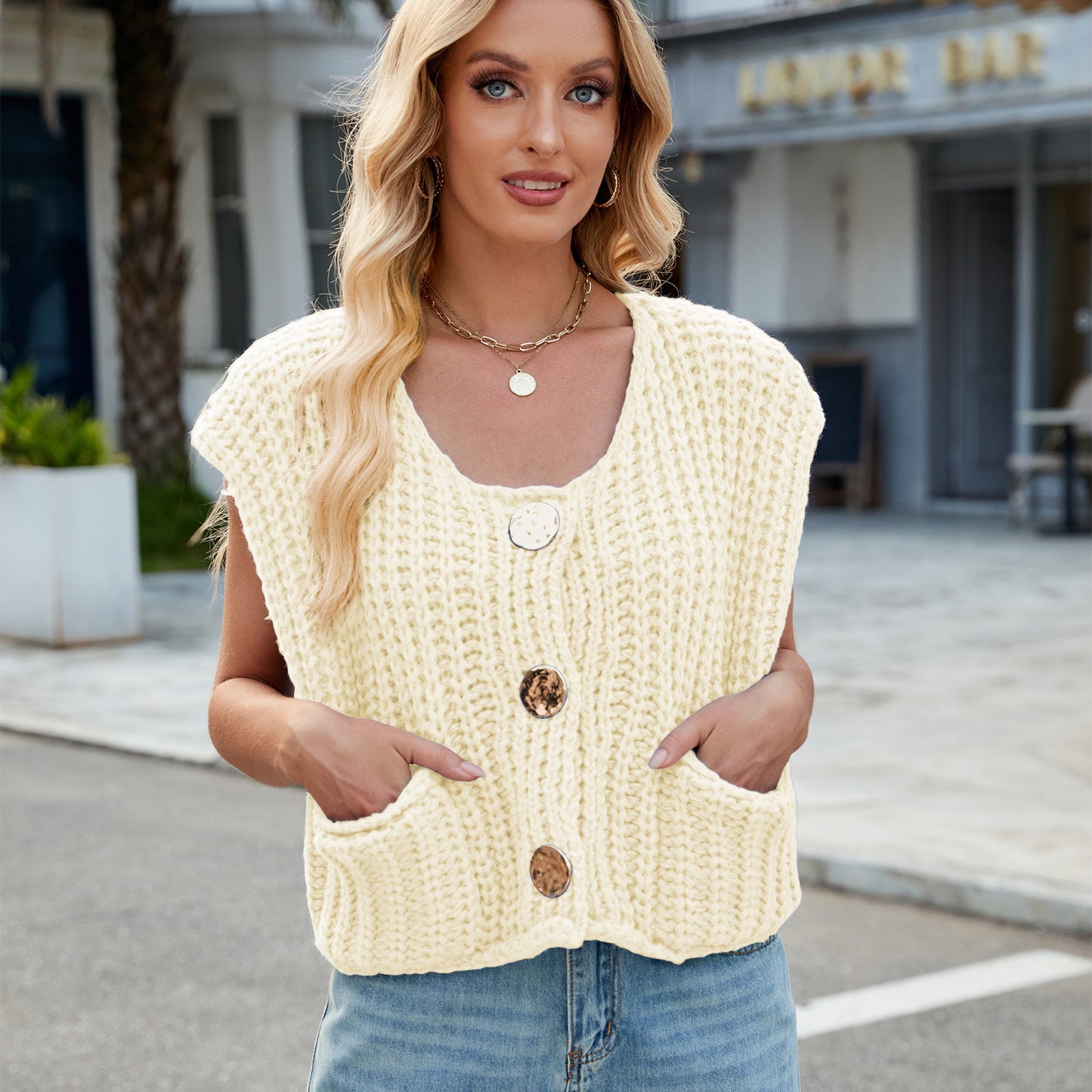 A Women's V-neck Three-button Sleeveless Cardigan free delivery