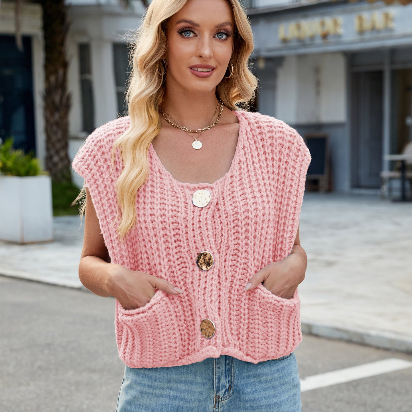A Women's V-neck Three-button Sleeveless Cardigan free delivery