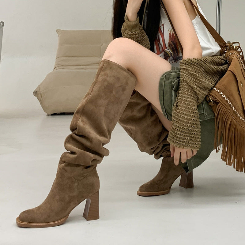 A Women's Fashion Casual Thick Heel High Leg Boot free delivery